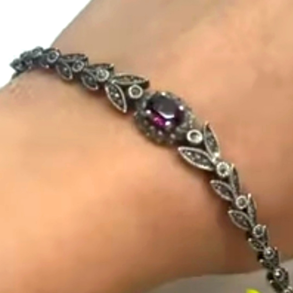 ISO Silver toned bracelet, marcasites, purple glass stone